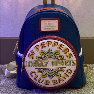 Loungefly Blue and Red SGT. Peppers Backpack